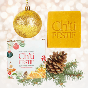 Savon Ch'ti Festif avec boîte imprimée à gauche et savon orange épicé à droite